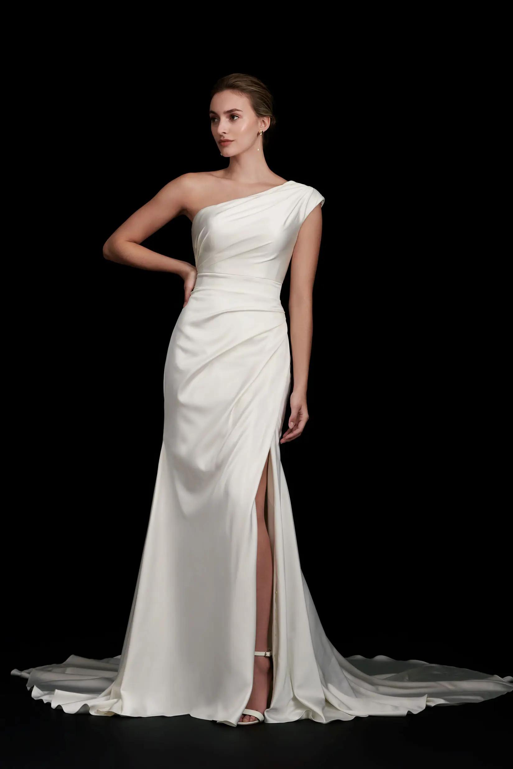 Louisa wedding dress with one shoulder cap sleeve and draped bodice and fitted skirt with a slit