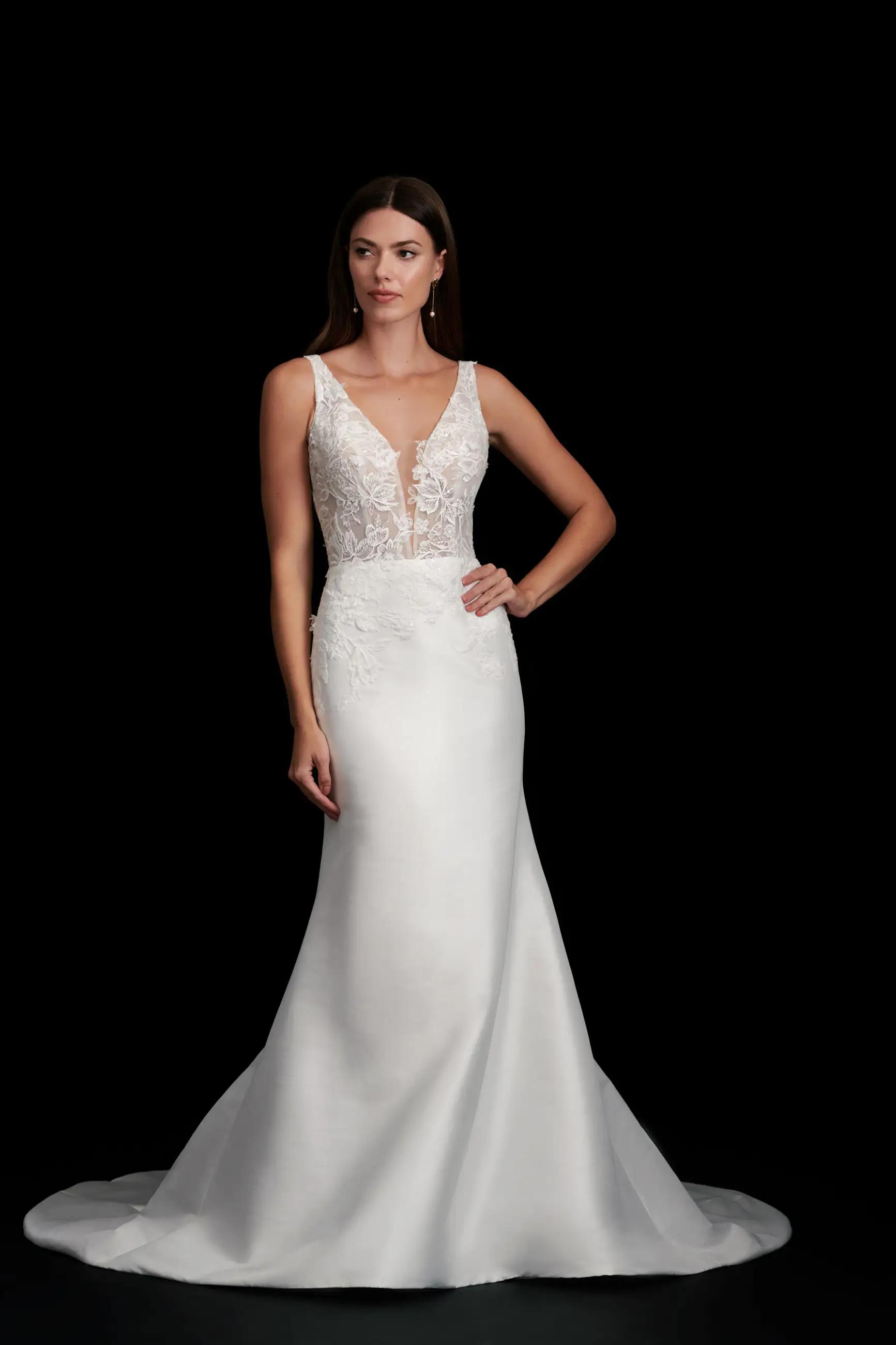 Francine wedding dress by Kelly Faetanini with V neckline and lace bodice with corset detail and mikado bow