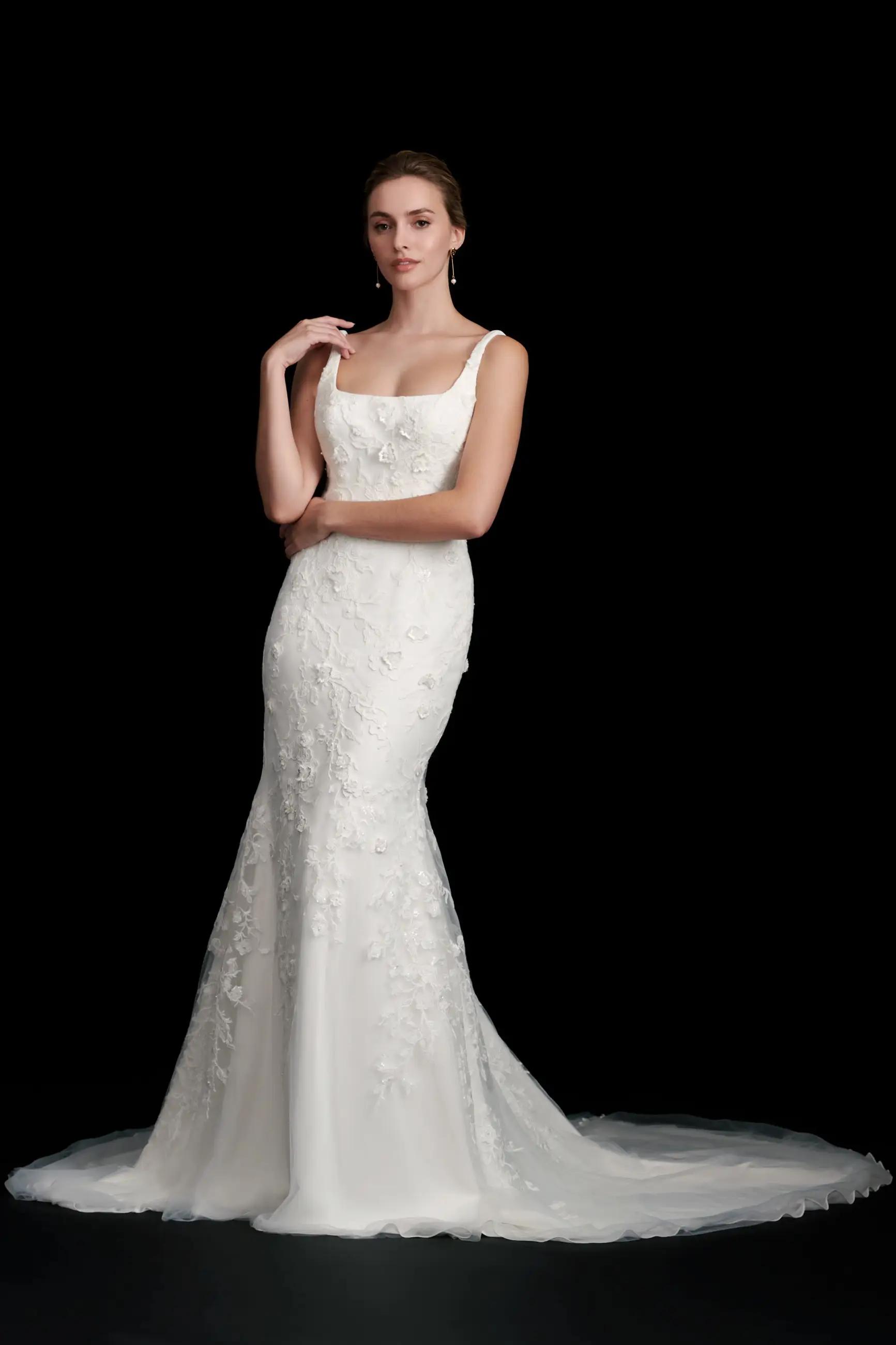 Josephine wedding dress by Kelly Faetanini with fit to flare silhouette and floral detail. Square neckline with low back