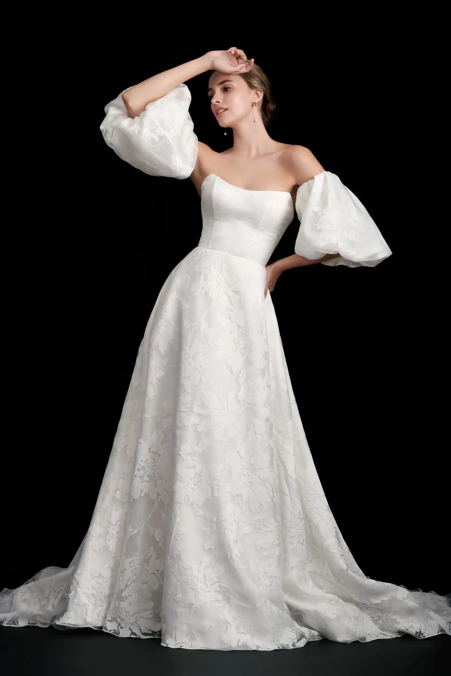 Jardins wedding dress by Kelly Faetanini with detachable sleeves and burnout organza floral A line skirt