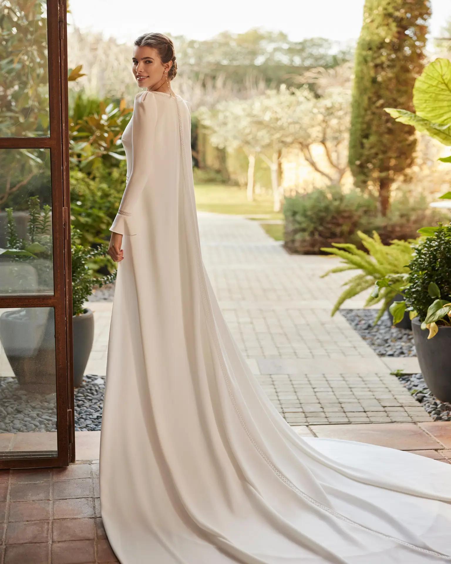Danesa Rosa Clara cape with sleeves for a regal bridal look in Columbus, Ohio