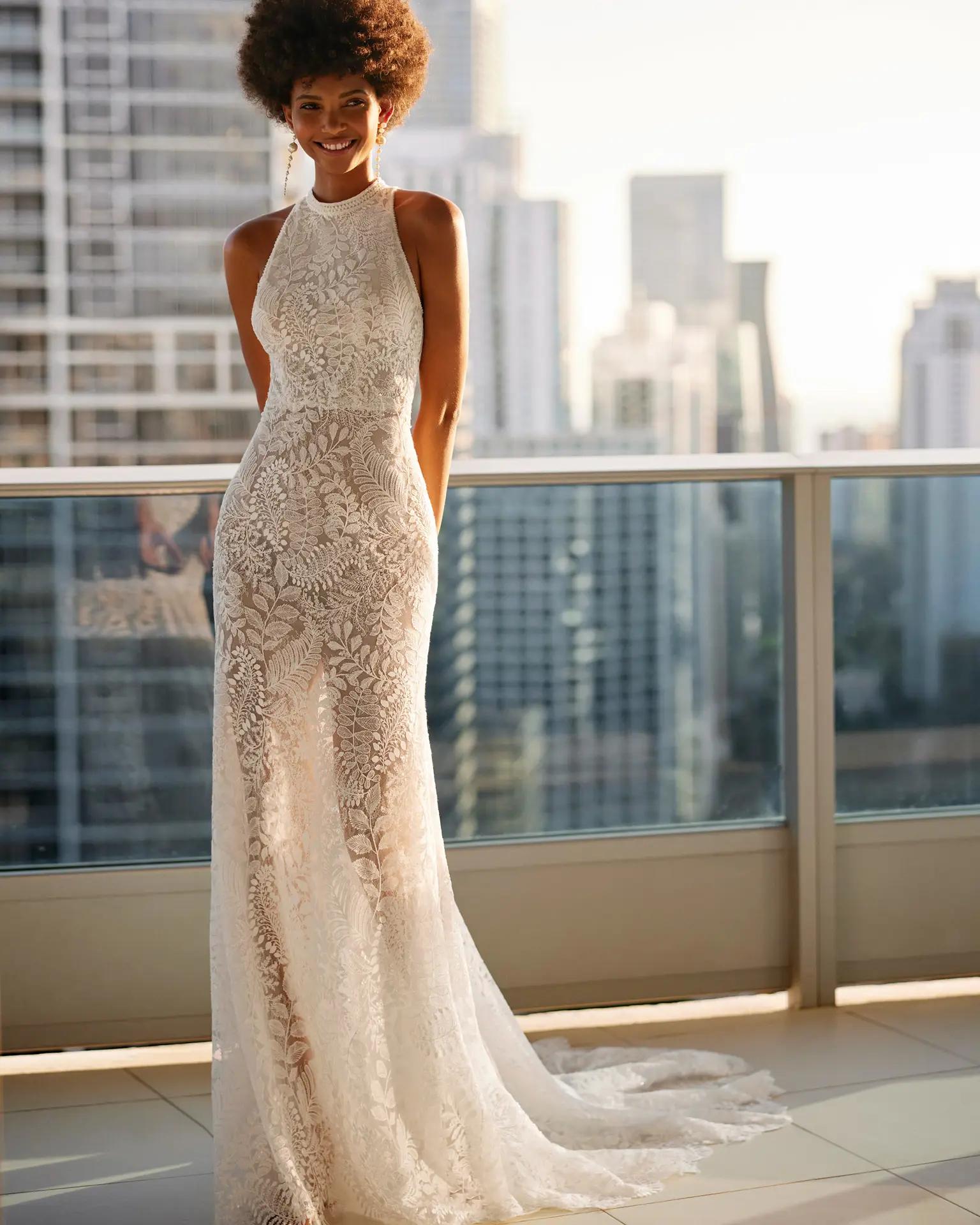 High neck wedding dress in Columbus, Ohio by Rosa Clara style Kloe with embroidered lace and open back and fitted silhouette