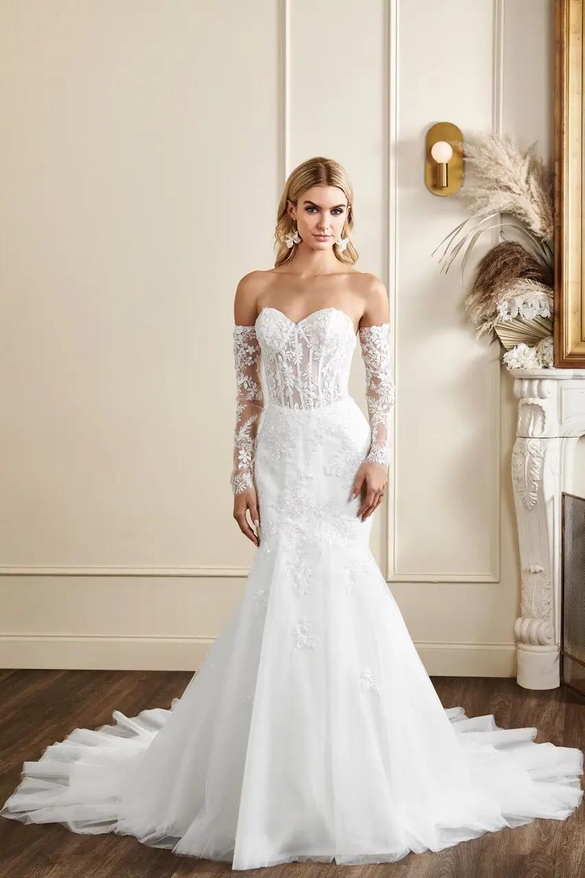 Charlotte wedding dress with Hailey Bieber detachable lace sleeves and mermaid lace and tulle silhouette with corset bodice and sweetheart neckline