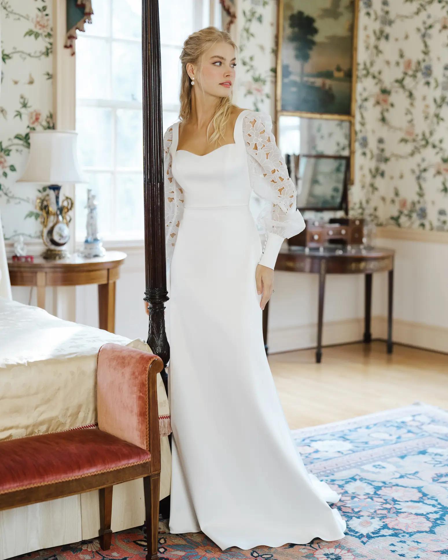 Grady wedding dress by Anne Barge Blue Willow with sweetheart neckline and crepe back satin fitted silhouette with detachable sleeves
