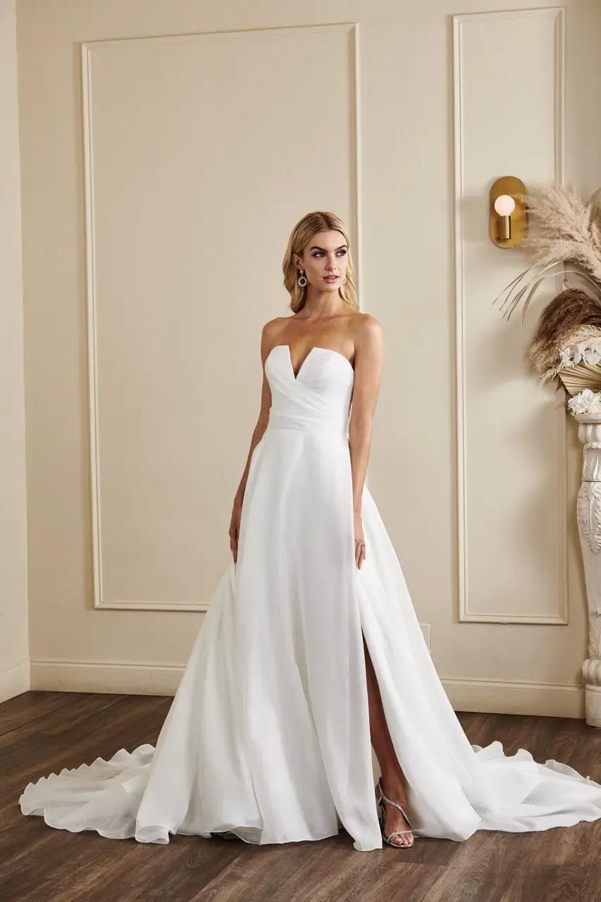 Hudson bridal gown with shimmering organza by Kelly Faetanini pleated strapless notch neckline bodice with slit in Columbus, Ohio