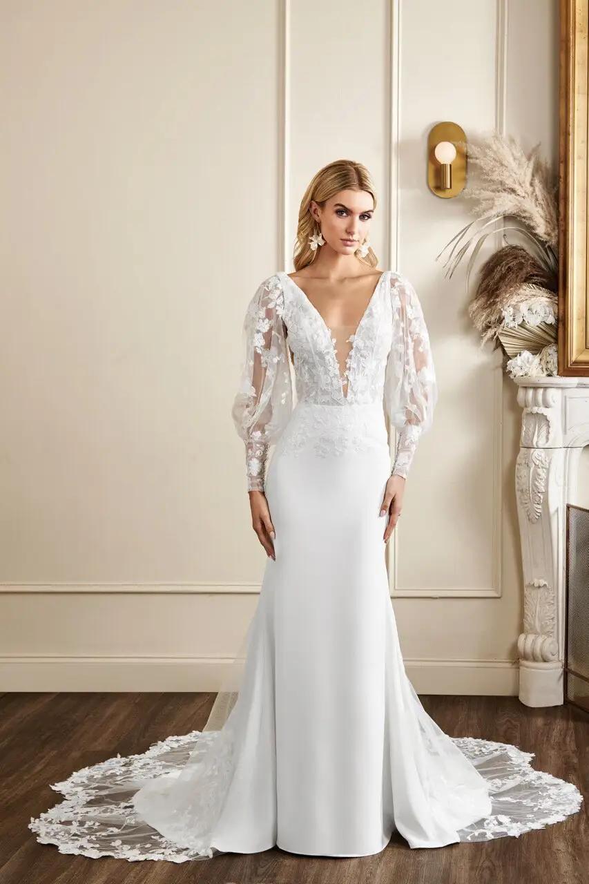 Kennedy wedding dress in Columbus, Ohio by Kelly Faetanini with detachable puff sleeves with cuff plunging neckline with lace bodice and crepe skirt