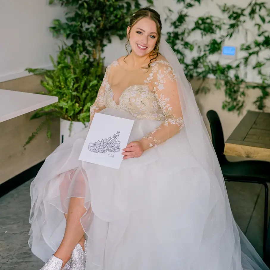 Сouple wearing a white gown and a white suit